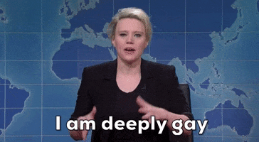 SNL gif. Kate Mckinnon is a newscaster in a skit and she says, "I am deeply gay." 
