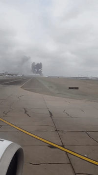 Smoke Plumes Rise from Wreckage After Deadly Plane Crash in Lima