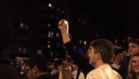 Students Climb Lamp Posts After Penn State Win