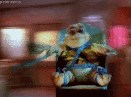 baby sinclair spinning GIF