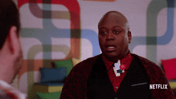 TV gif. Tituss Burgess as Titus Andromedon on Unbreakable Kimmy Schmidt points at someone and then himself and finally motions a rainbow shape with his hands. As he says, “you. me. same.” The look on his face seems dumbfounded that the other person doesn't understand the truth. 