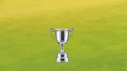 A golf ball sinking into a hole with US OPEN text, symbolizing sports championship coverage.