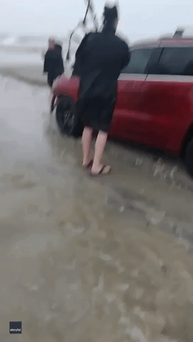 Bagpiper Plays Funeral Song for Jeep Stranded on Myrtle Beach Shore