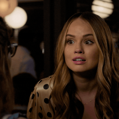 TV gif. Debby Ryan as Patty Bladell on Insatiable '' nods her head and lips her eyebrows as she says, “Yeah.” 