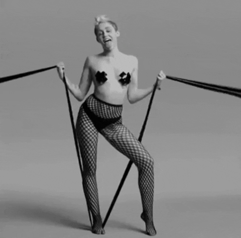 nicolewalker5e0a miley cyrus miley bdsm topless GIF