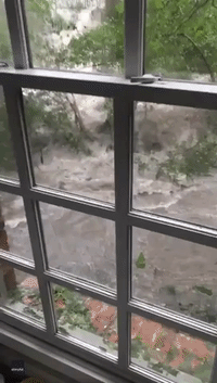 'We're Safe on the Upper Level' - Dallas Family Trapped Inside as Floodwaters Surge Past Home