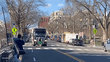 Lone Cyclist Slows Down Trucker Convoy in Washington