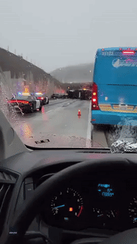 Truck Tumbles Over California Freeway on Top of Pile-Up