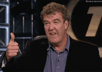 TV gif. Jeremy Clarkson gives a thumbs up and a sarcastic, goofy, toothy smile.