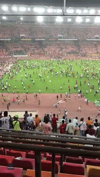 Nigerian Soccer Fans Storm Field After Team Loses World Cup Qualifier to Ghana