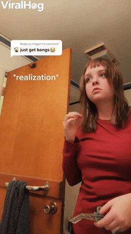 Girl Cutting Fake Bangs Realizes She is Also Cutti