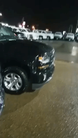 Severe Hailstorm Wrecks Cars in Dealership Lot in Cullman, Alabama