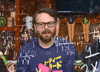 TV gif. Greg Miller from Kinda Funny counts on his fingers with a perplexed expression while a flurry of equations floats around him. 