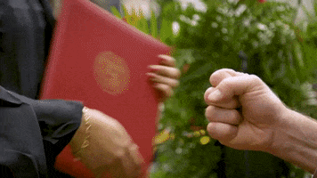 Graduation Fist Bump GIF by University of Central Missouri