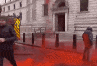 red london protest fake blood climate protest GIF