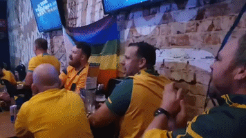 Fans in Perth Cheer on Socceroos