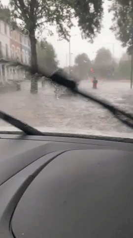 London Drivers Navigate Flooded Streets Amid Slow-Moving Storms