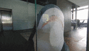 comspace bored office alone shark GIF