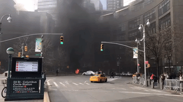 Smoke Rises in Midtown Manhattan as NYPD Truck Catches Fire