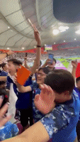 Japan Fans Celebrate Win Over Germany