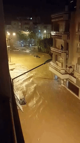 Cars Submerged as Floodwater Inundates Street in Antalya