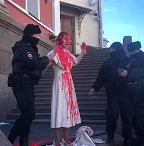 St. Petersburg Artist Covers Herself in Fake Blood