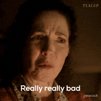 Sponsored gif. Video of Holly A Morris as Claire Kelly on Teacup saying gravely with tears in her eyes, "Really really bad." Text, "Really really bad." The Peacock logo in the bottom right hand corner.