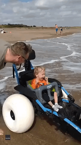 Beach Wheelchair Helps Young Boy Finally Enjoy the Seaside