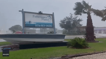 Airborne US Flag Caught on Sign in Matagorda as Texas Braces for Tropical Storm Nicholas