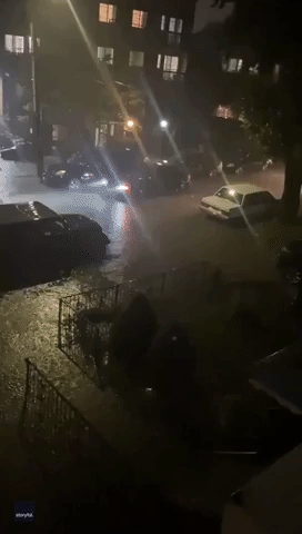 Cars Stuck in Floodwater in Queens Neighborhood Amid Deadly Downpour