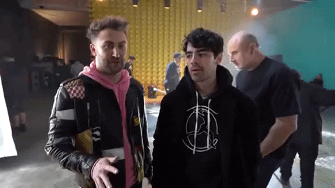 jordanmcgraw giphygifmaker surprise sneaky joe jonas GIF