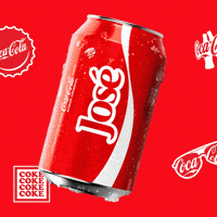 Sponsored gif. A red can of Coca-Cola with the name "Jose" slides in from the left, pauses, and slides to the right offscreen. Coca-Cola logos on bottle caps and sunglasses are in the background.