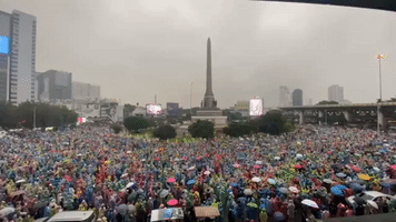Pro-Democracy Protesters Throng Bangkok's Victory Monument