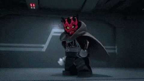 Movie gif. Darth Maul in Lego Star Wars spins a lightsaber, then holds it up as lasers extend from both sides and he tosses his head back with a maniacal expression. Text, "Awesome."