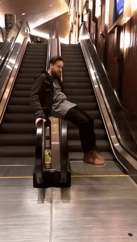 Man Finds an Innovative Use for Parallel Escalators