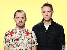 Elijah Wood Shrug GIF by BBC America