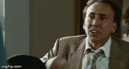 laughs cage GIF