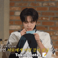 Leo Taking Notes GIF