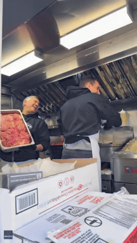 'He's a Natural': Bradley Cooper Cooks Cheesesteaks for Charity