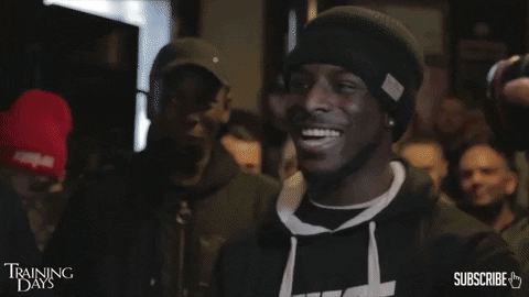 Reaction gif of someone noticing something shocking in the background