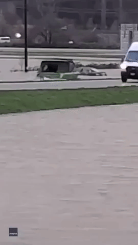 Boater Takes to Flooded Highway Amid Deluge in British Columbia