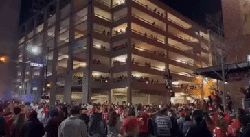 Chiefs Supporters Sing From Parking Garage Following Super Bowl Win