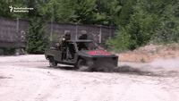 Mechanics Revamp Demolition Derby Cars for Ukrainian Troops on Front Lines