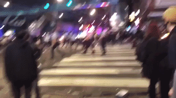 Police Rush Crowd on Sidewalk During Second Night of Protests Over Police Shooting of Walter Wallace Jr.
