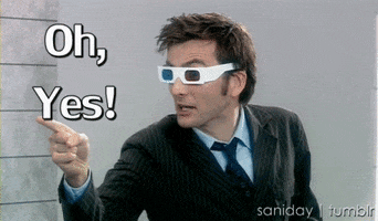 TV gif. David Tennant as Tenth Doctor in Doctor Who points while wearing 3D movie glasses. Text reads, "Oh, yes!"