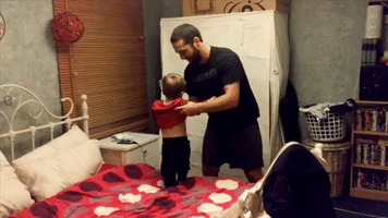 Dad Recreates Wrestlemania With Giggling Son