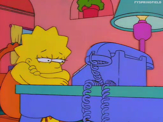 The Simpsons gif. Head resting in her arms, a bewildered Lisa stares at the phone in front of her, waiting for it to ring.