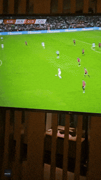 Soccer Fan Watches Euro 2024 Qualifier From Comfort of Hotel Room