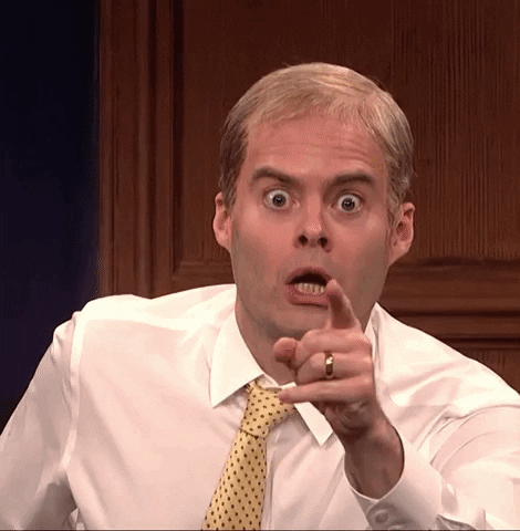 SNL gif. Bill Hader impersonating Jim Jordan wearing a shirt and tie points at us as if to say, It's you! with an astonished look on his face.