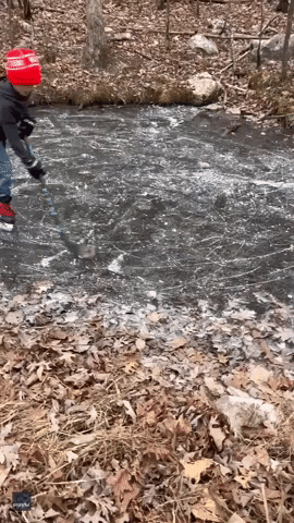 Young Boy Takes Advantage of Alabama's Freezing Weather to Practice Hockey Skills